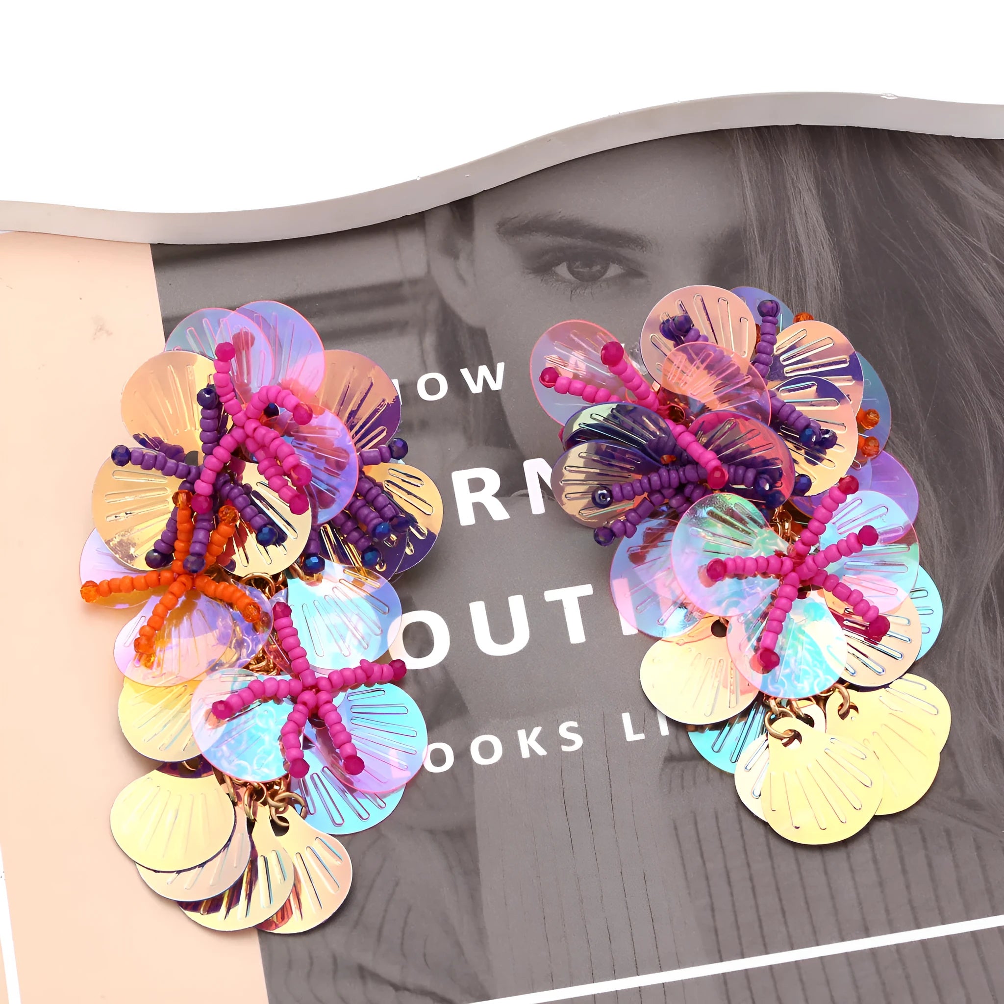 Handmade string bead flower earrings with exaggerated floral design in colourful, rose, or purple options