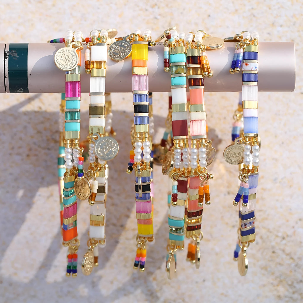 Women's handmade bracelet with imitation pearls and coloured glass beads in original design