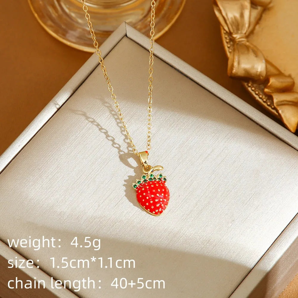 Women's delicate titanium steel necklace with a small cherry charm pendant on an O-ring chain.