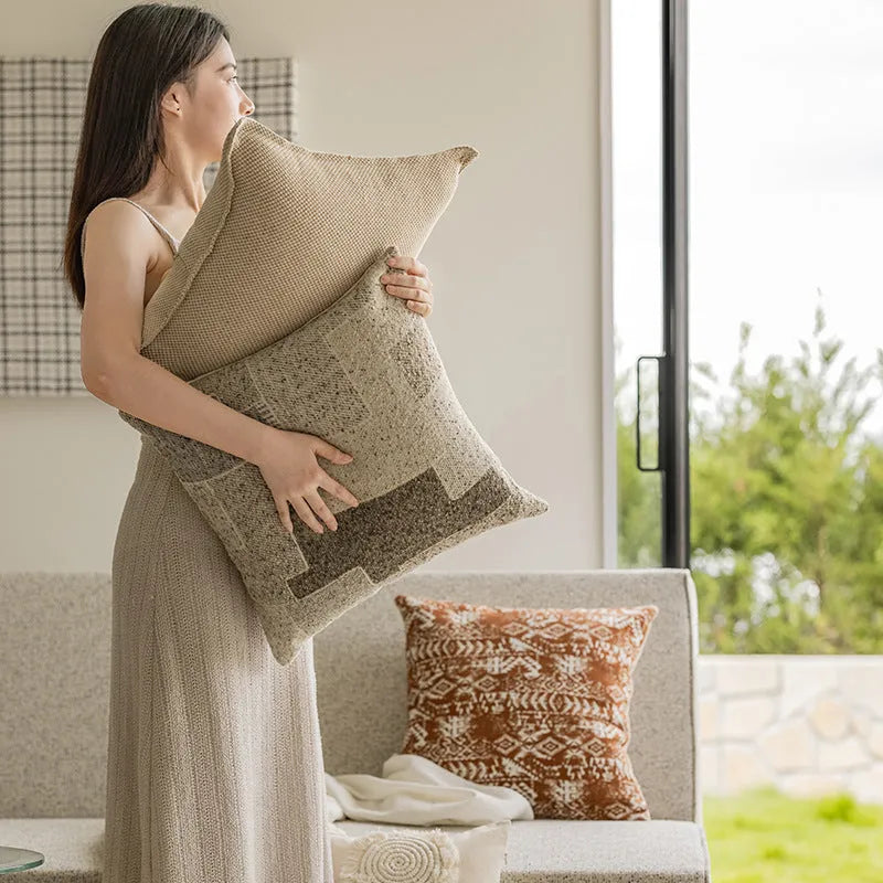 45cm square cushion pillow in solid colour with decorative edge stitching on sofa
