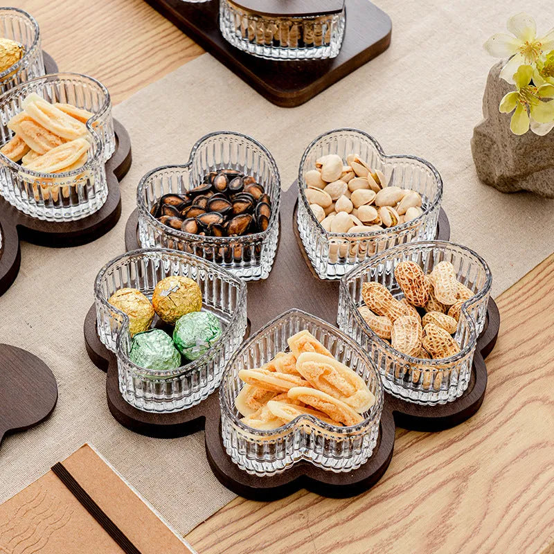Glass dim sum plate with heart-shaped transparent lids showing solid colour finish