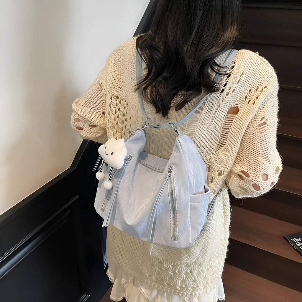 Women's soft PU backpack in black, milky white, silver and blue colour options