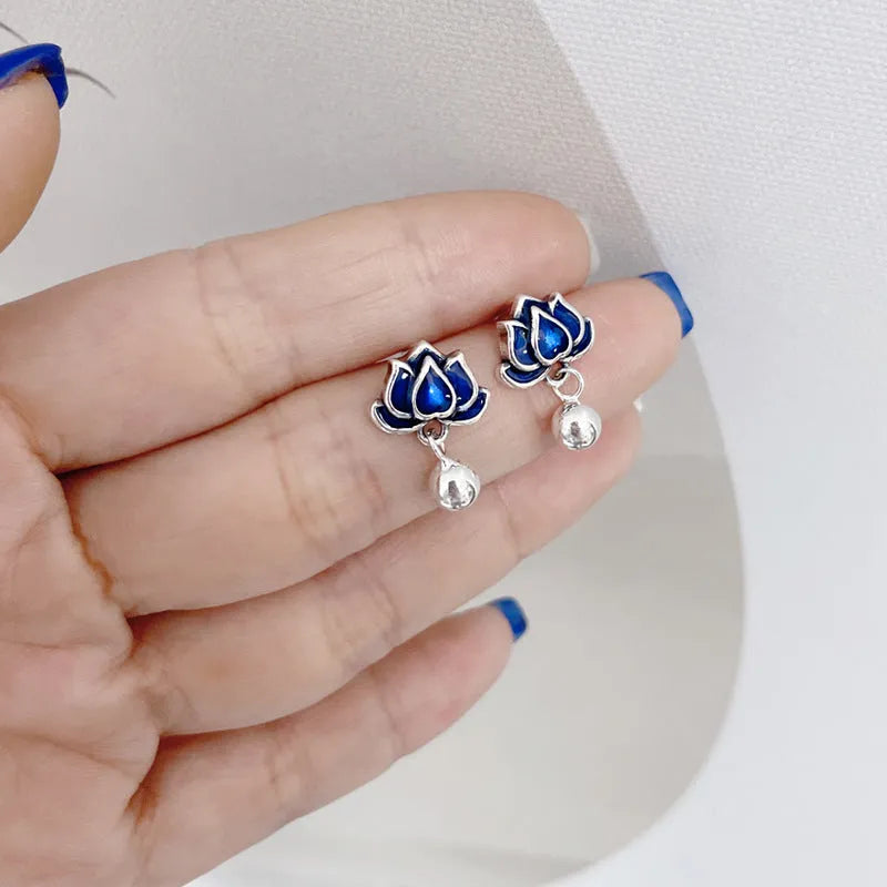 Blue lotus earrings with retro seedpod tassel design and flower shape measuring 1.2cm wide