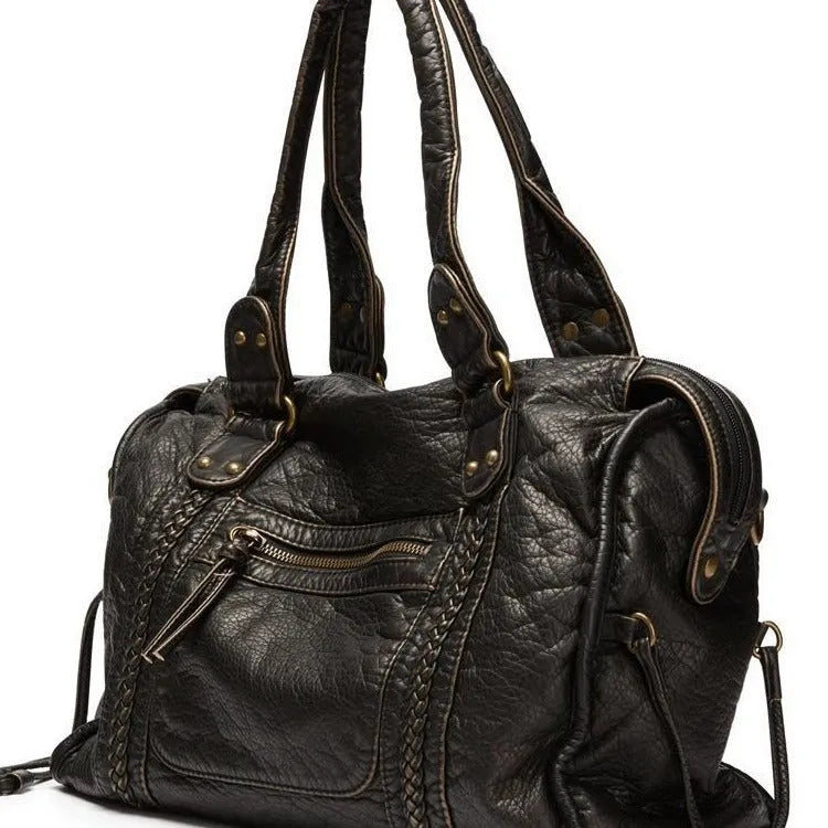 Women's brown soft PU leather retro messenger bag with a single shoulder strap, shown open to reveal internal zippered organisers.