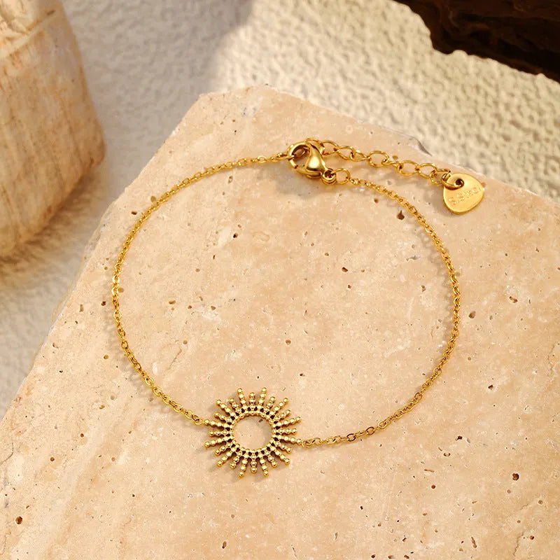 Sunflower yellow gold jewellery set with geometric chain necklace and bracelet