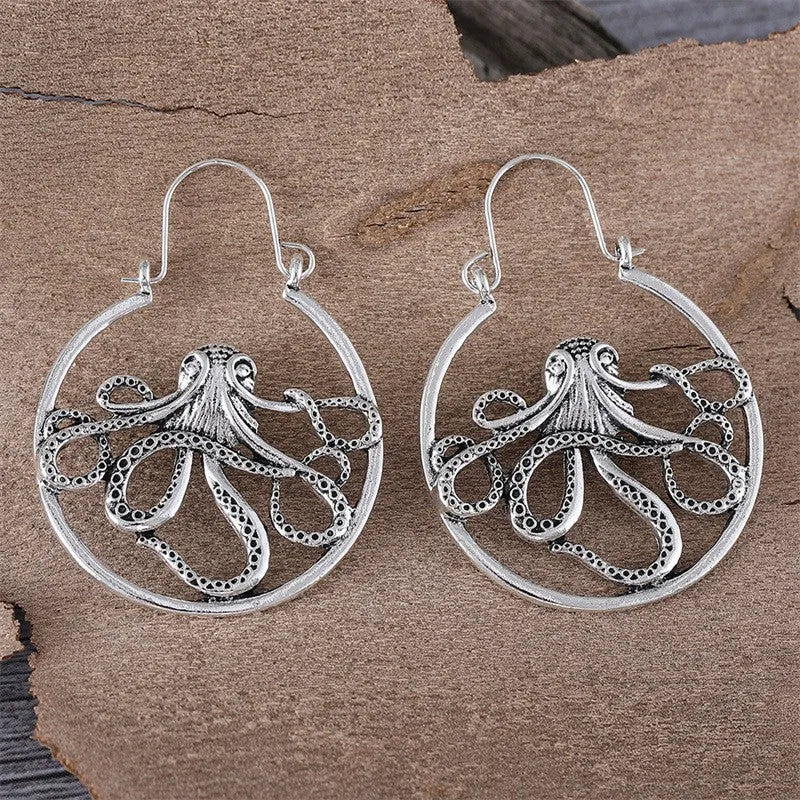 Vintage antique silver octopus earrings with electroplated finish and animal zodiac modelling