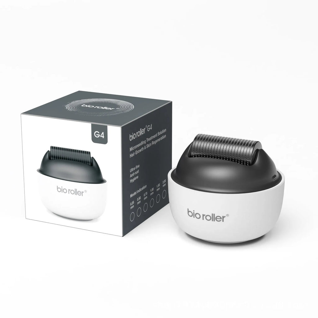 Men's G4 white portable beard derma roller with six microneedle length options on a clean surface