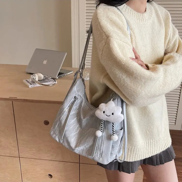 Women's soft PU backpack in black, milky white, silver and blue colour options