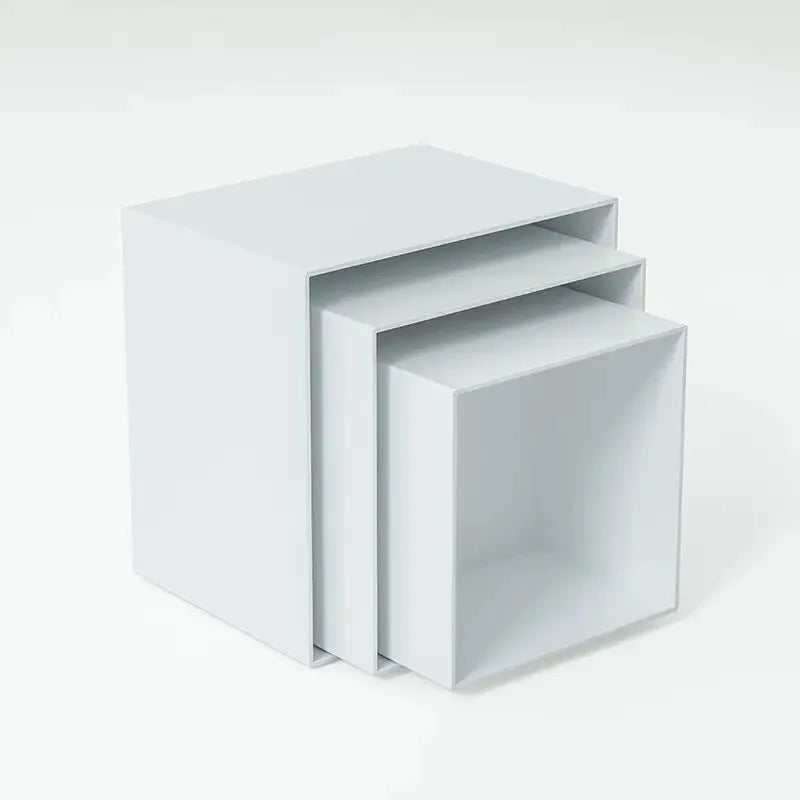White plastic Suit Cube dessert display stand with six tiers showing cupcakes