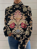 Black loose fit turtleneck long sleeve sweater with a raised 3D pattern texture.