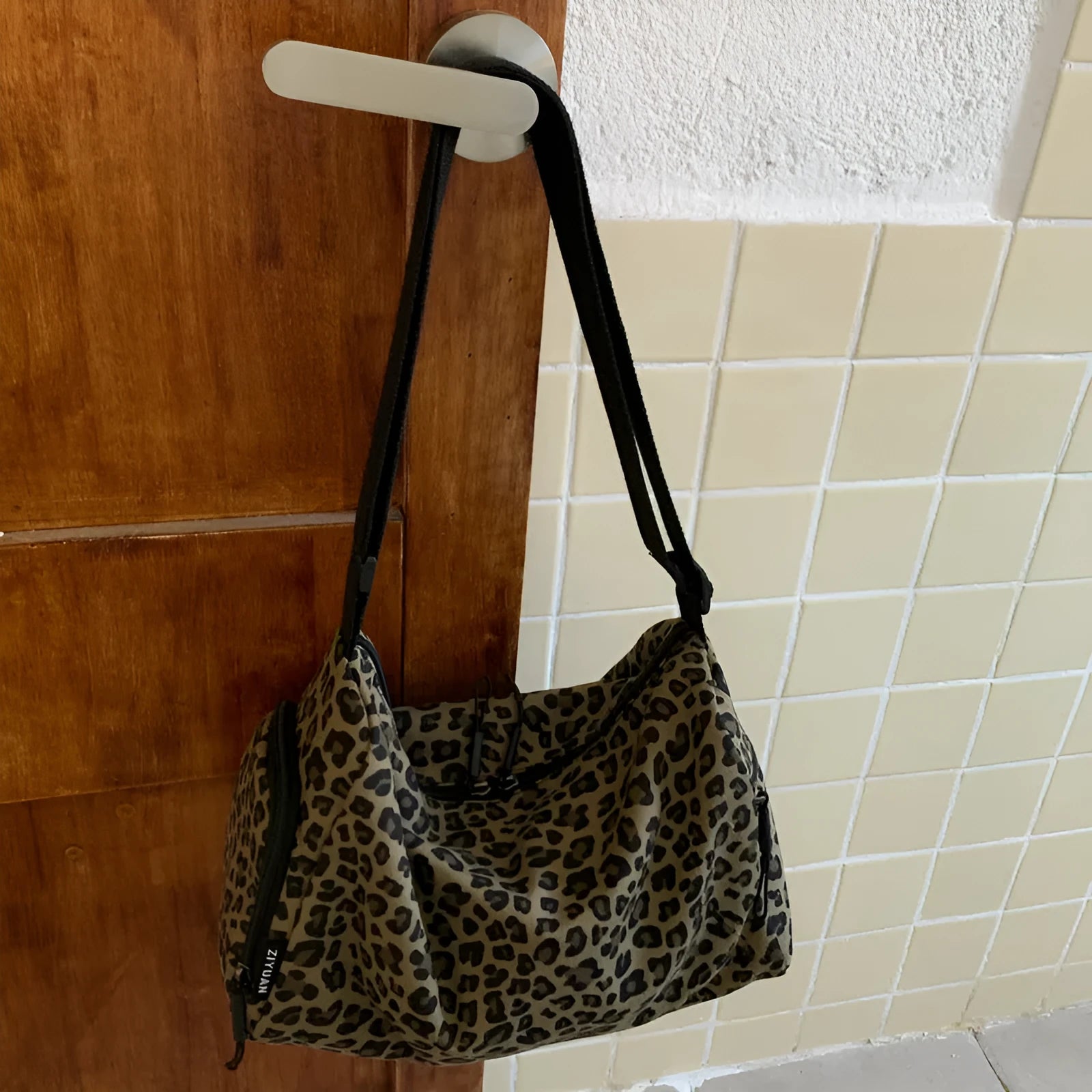 Large capacity leopard print crossbody shoulder bag with sports style stitching details