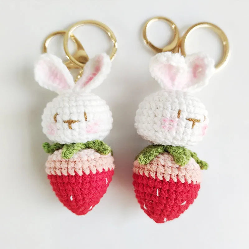 Hand-woven colourful doll wire pendant shaped as a rabbit with a strawberry design, featuring a key loop.