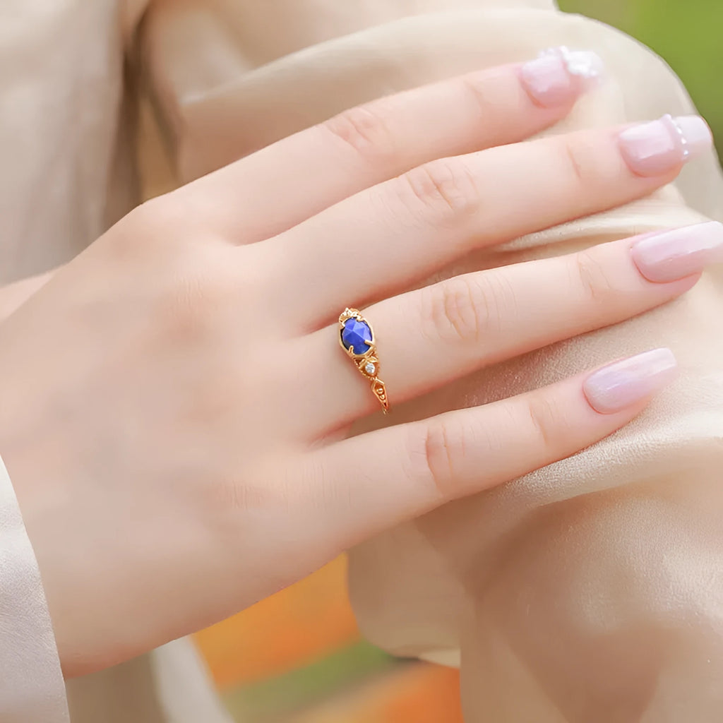 Lapis lazuli ring with geometric silver setting showing forest night sky colour stone