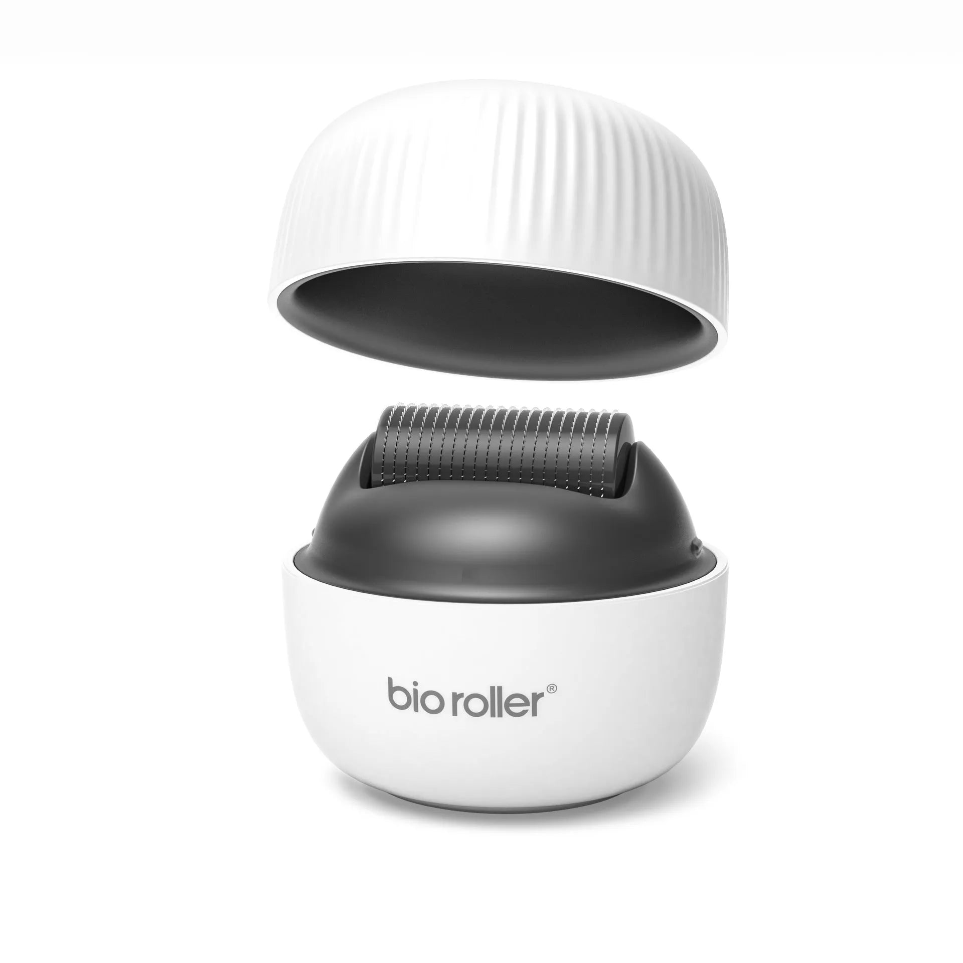 Men's G4 white portable beard derma roller with six microneedle length options on a clean surface