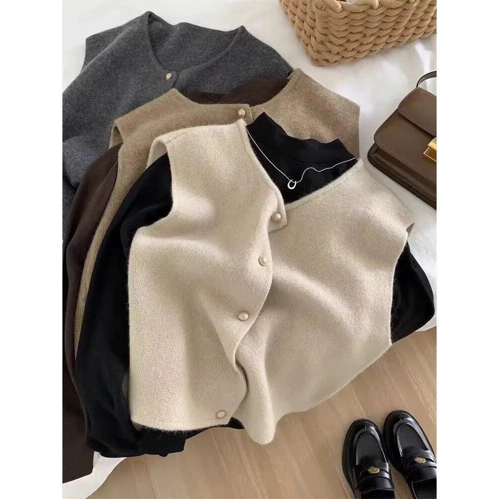 A thin, half-sleeve polyester pullover top shown in a choice of smoky grey, greige, apricot, golden camel, black, or Angora red.