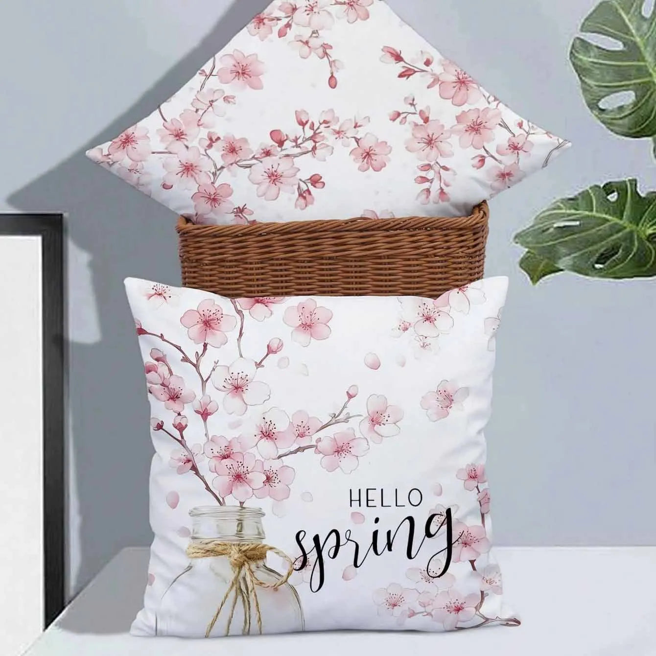Square short velvet cushion cover with cherry blossom and letter print, 45cm by 45cm.