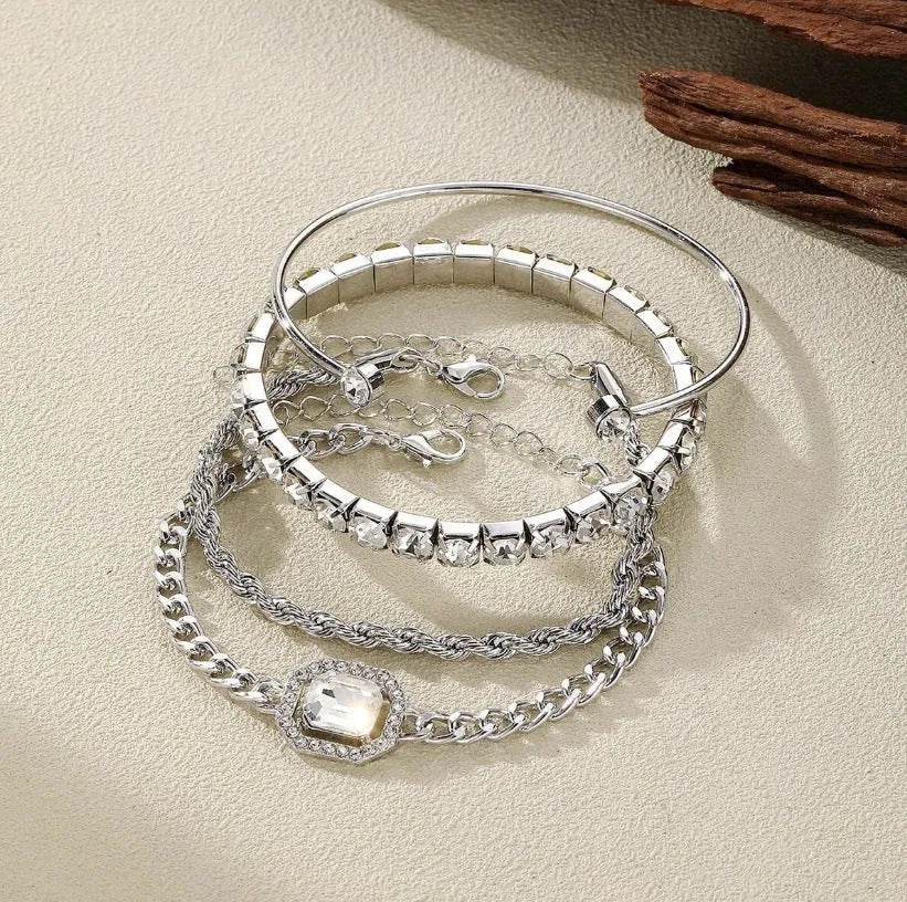 Women's retro geometric alloy bracelet four-piece set showing square diamond detailing on metal chain