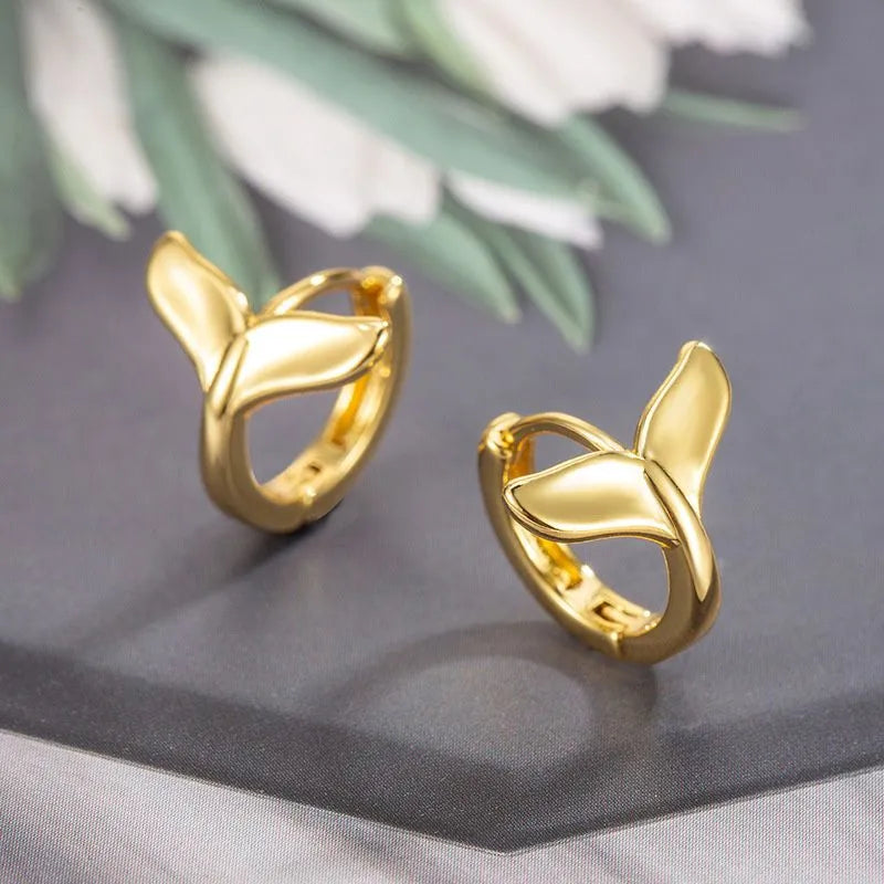 Women's fashion fishtail earrings in electroplated copper with white gold or yellow gold colour options