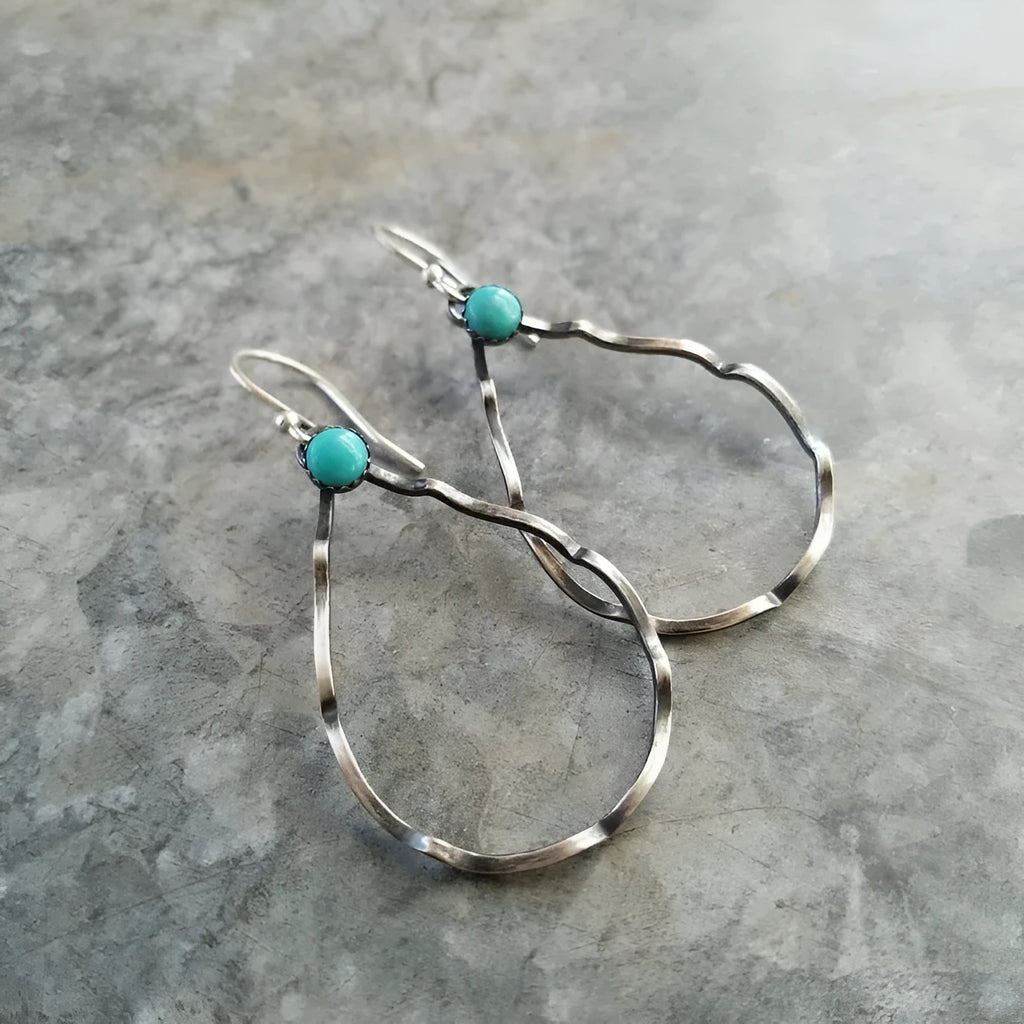 Bohemian style geometric circle earrings with turquoise detail in antique silver finish