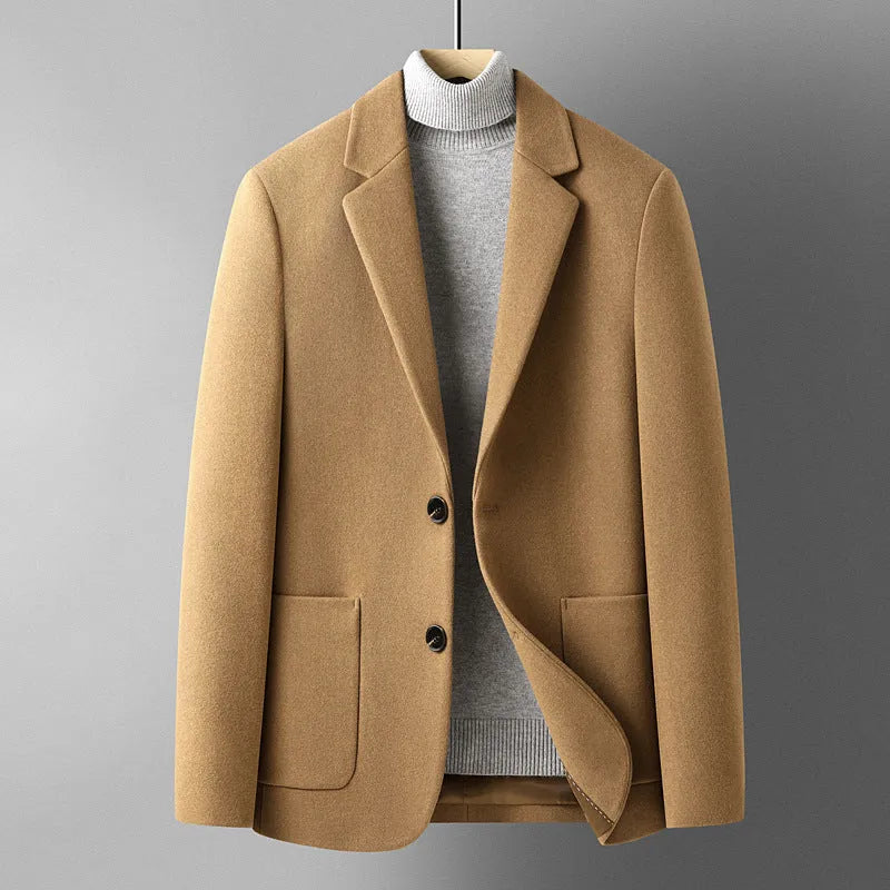 Men's grey slim fit wool blend suit jacket with notch lapel, shown on a model.
