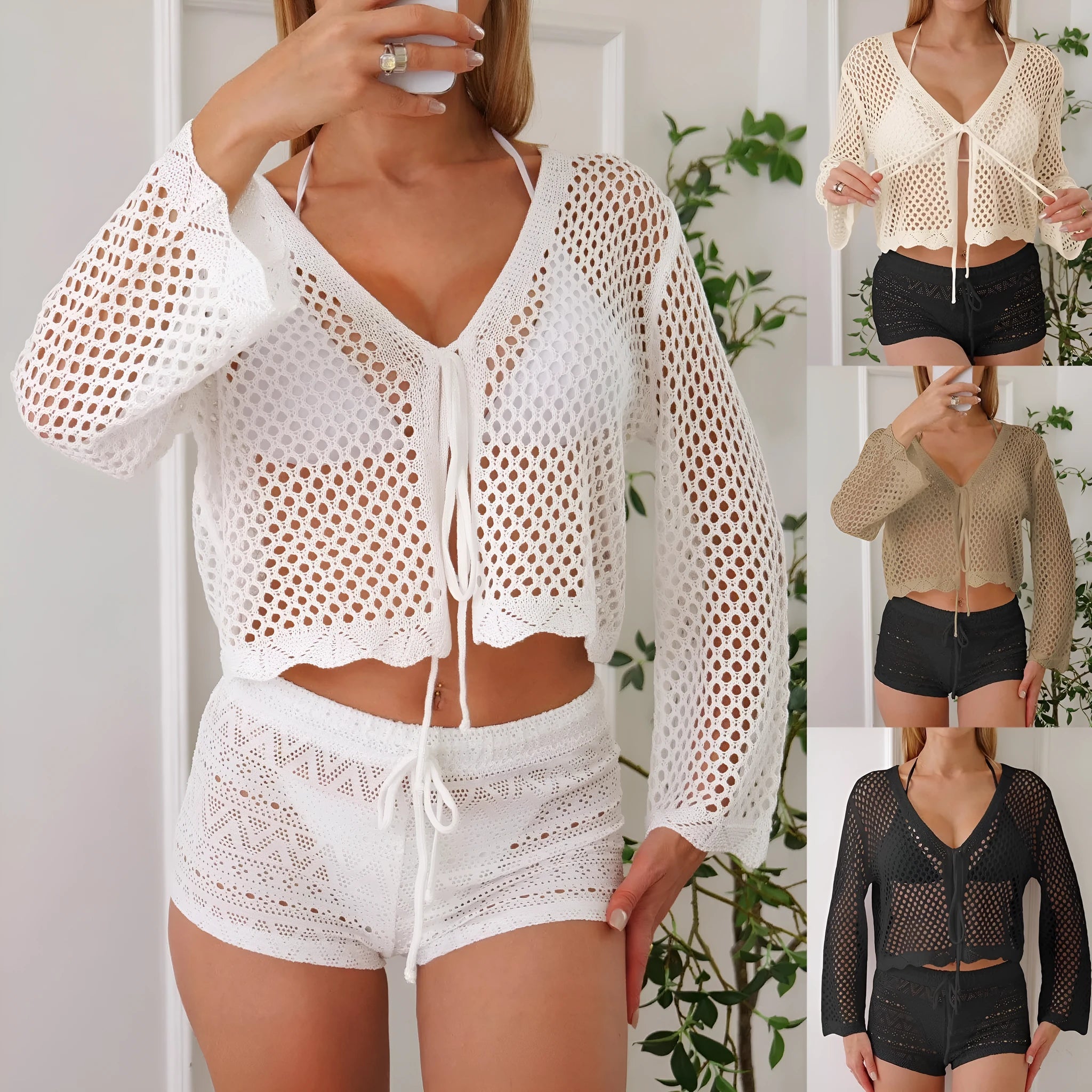 Short apricot coloured women's cardigan blouse with long bell sleeves on a hanger.