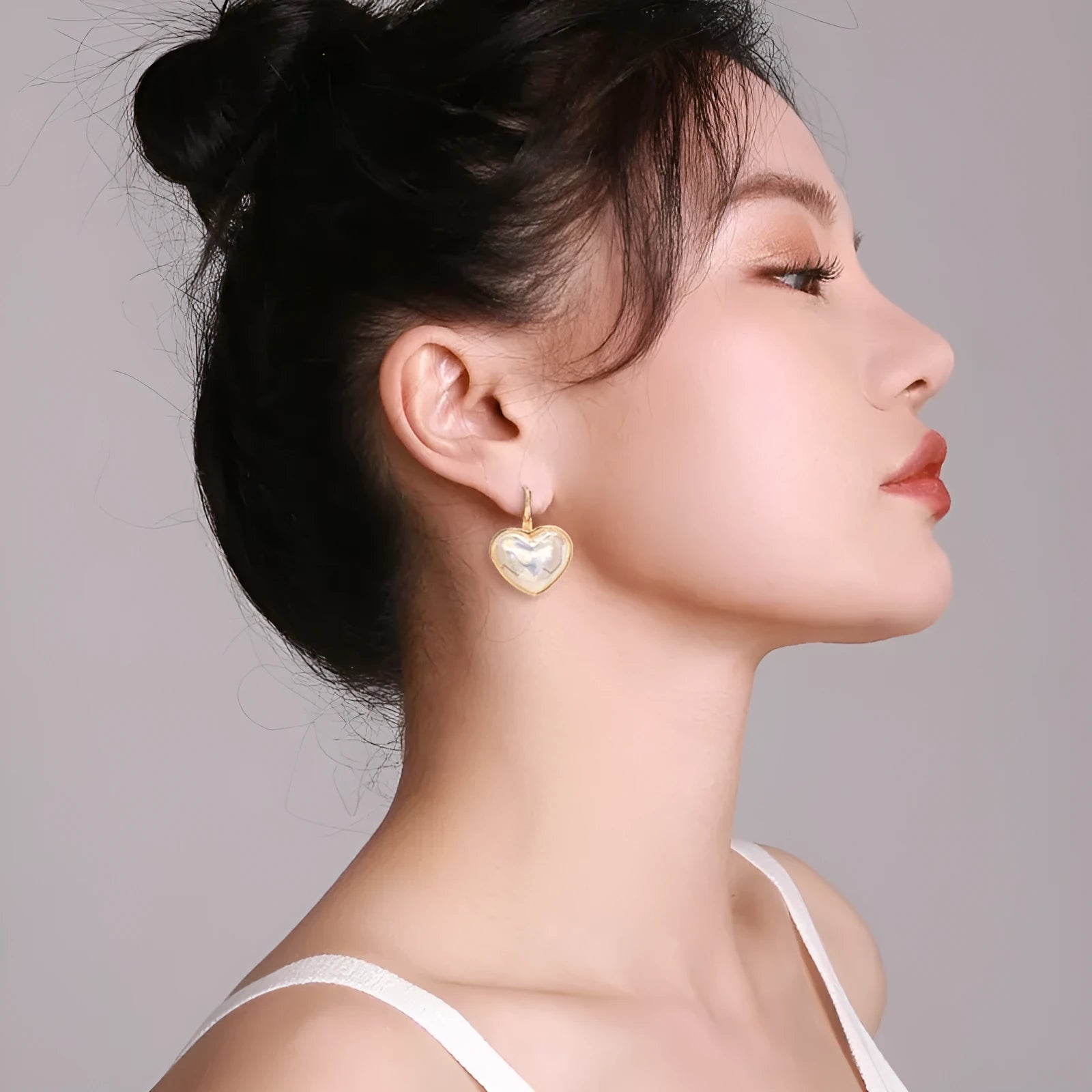 Gold colour alloy metal ear clips with summer love design theme for women's fashion