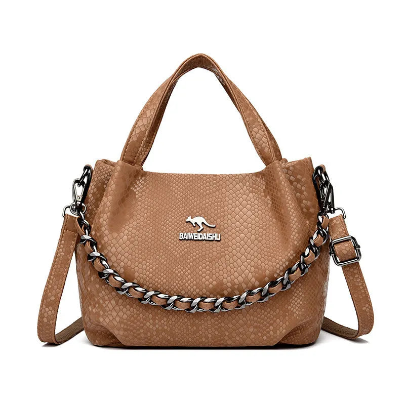 Genuine leather horizontal square shoulder bag with chain detail and snakeskin texture, multiple zippered compartments, available in various colours
