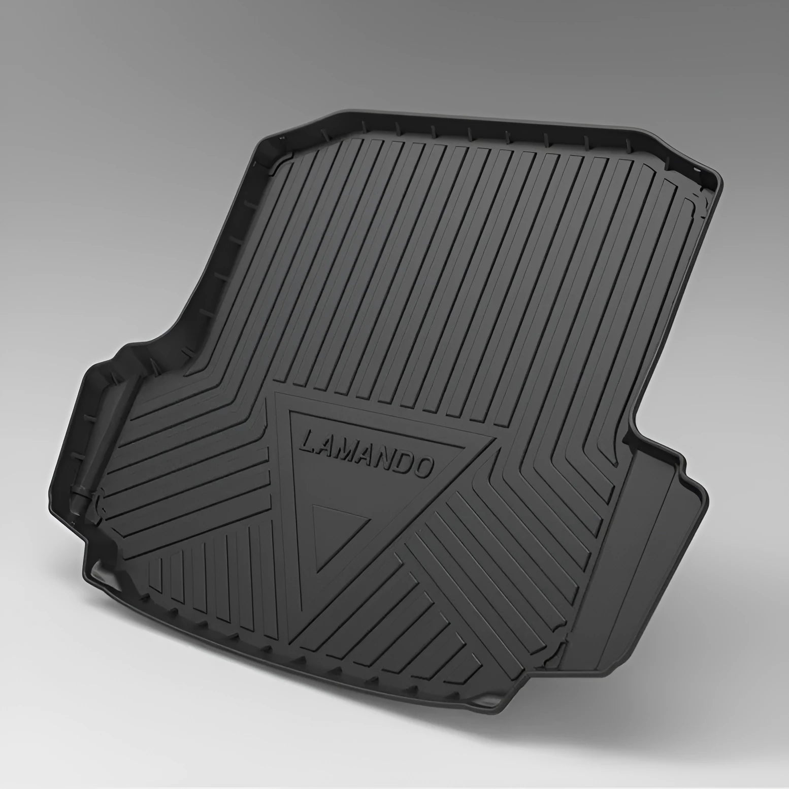 Black car boot liner with carbon fibre pattern texture, laid flat showing its tailored shape.
