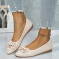 Women's beige flat casual slip-on loafers with a bow knot and shallow mouth design.