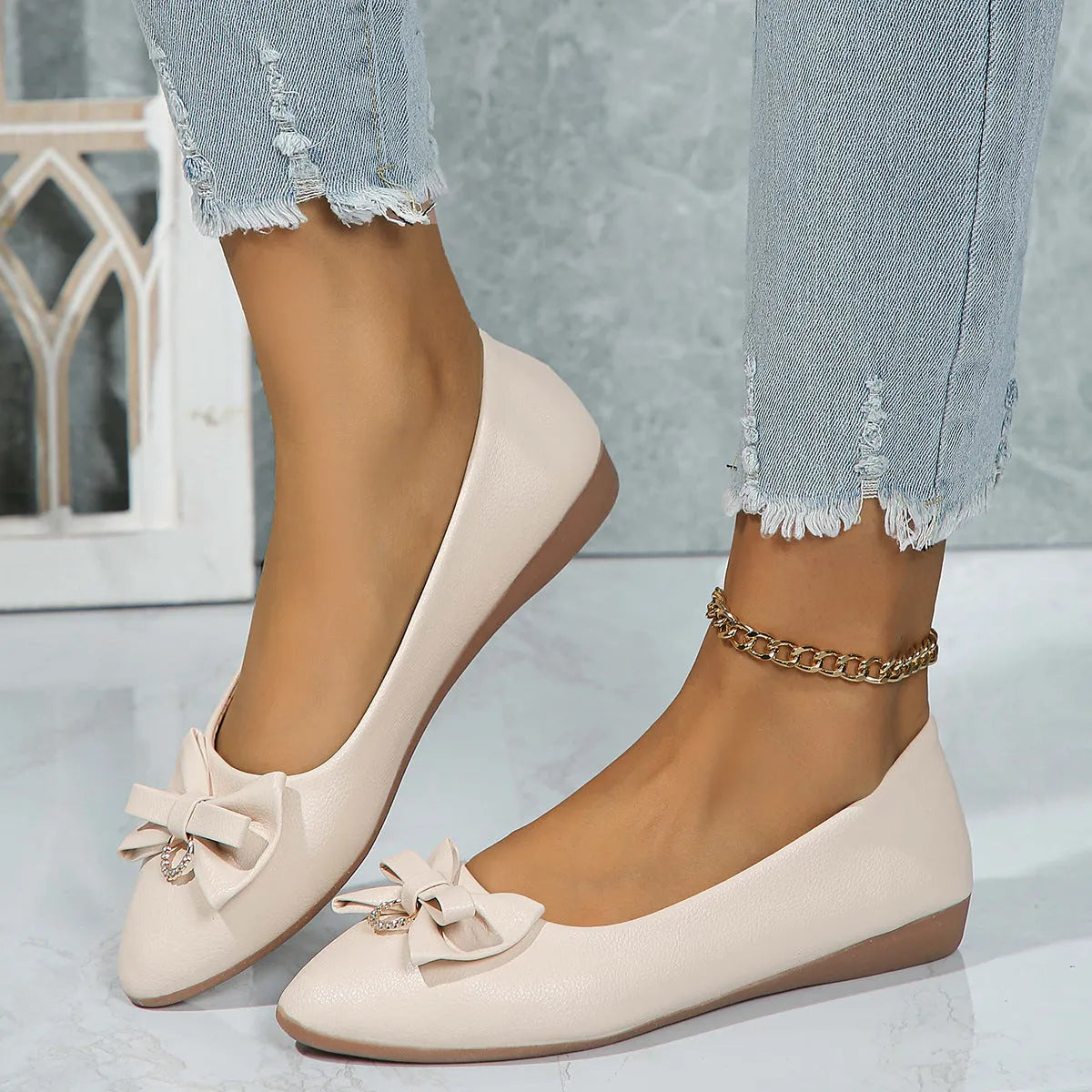 Women's beige flat casual slip-on loafers with a bow knot and shallow mouth design.
