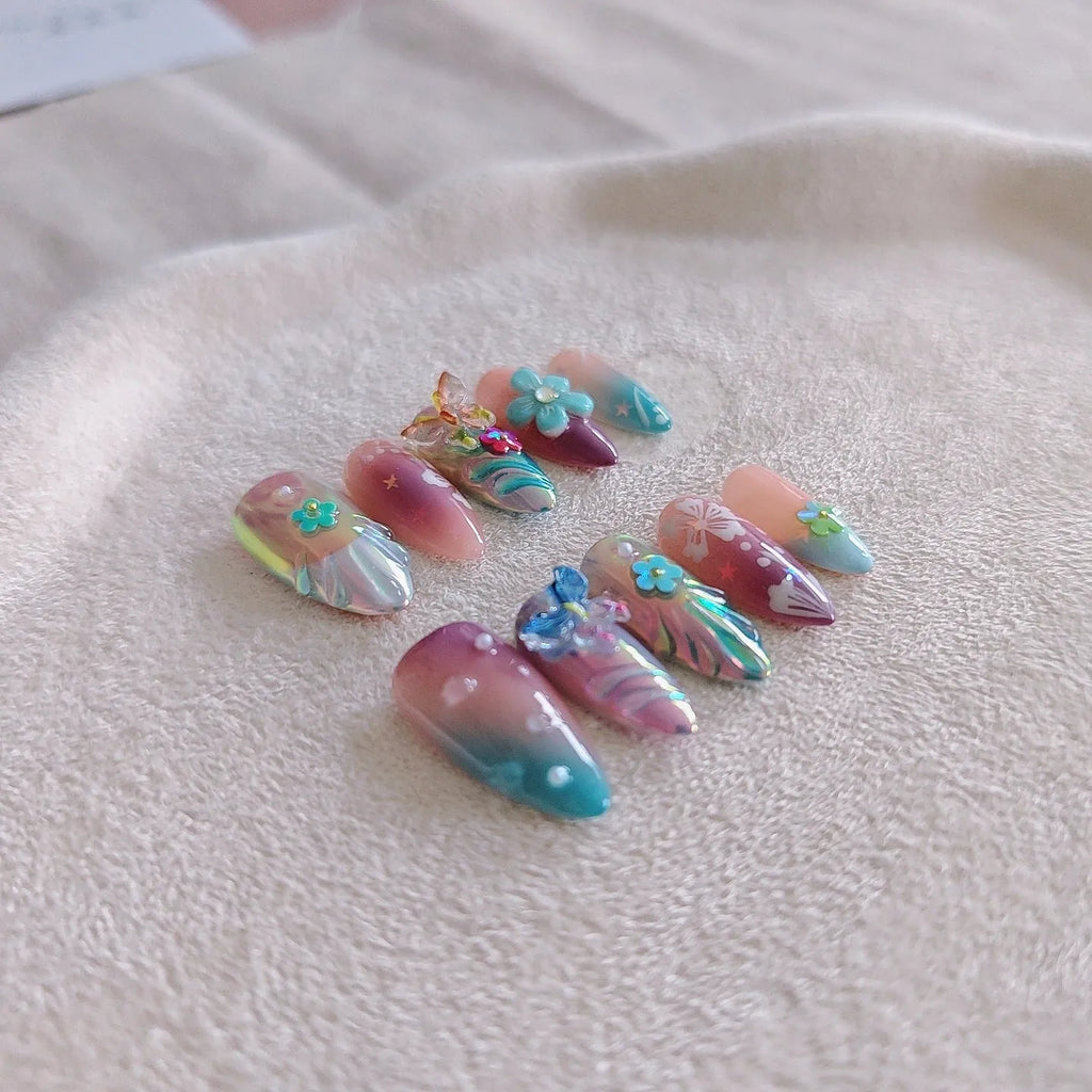 Handmade colourful small flower and butterfly sculpture manicure nails in floral patterns