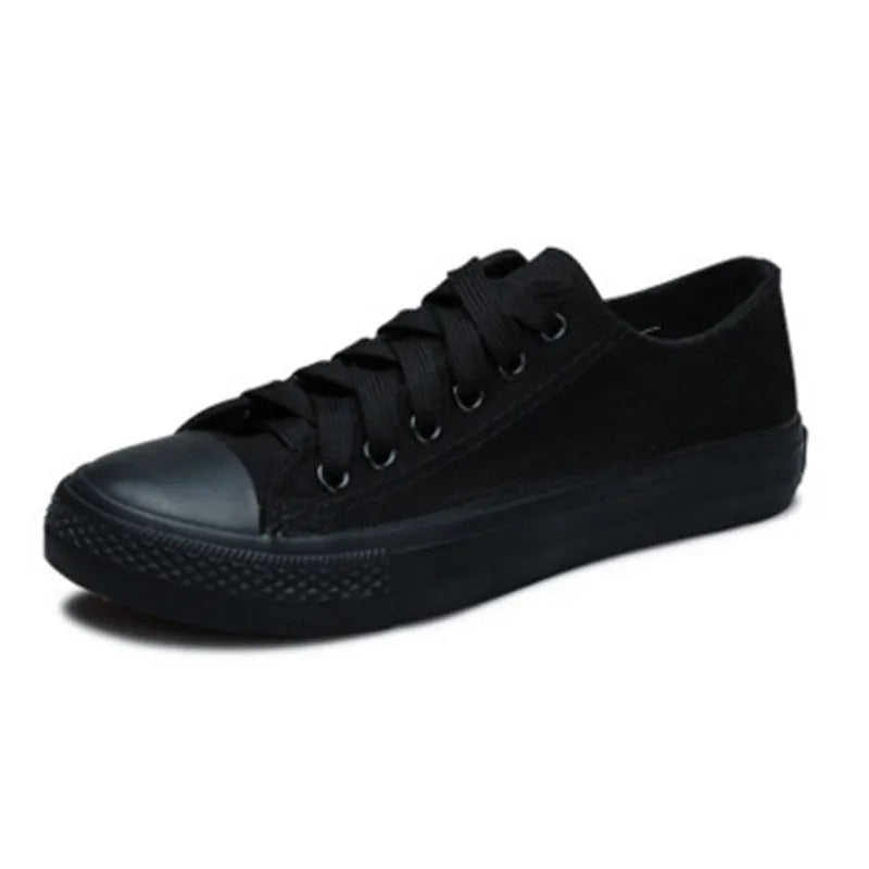 Women's casual canvas shoes in solid colours showing black, white black, white red, and all black options