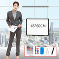 45x60cm hanging whiteboard with black frame, whiteboard pens, magnetic particles, eraser, and pen tray on a wall