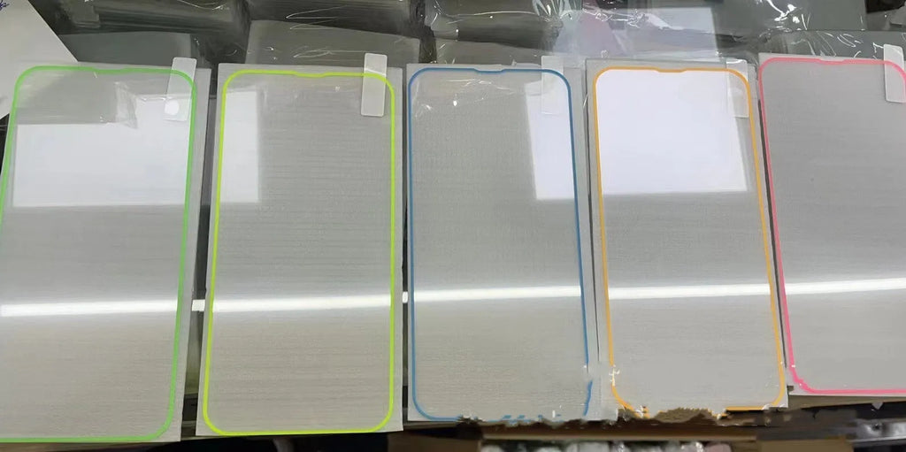 Fluorescent glowing tempered glass screen protector for iPhone on a dark background.