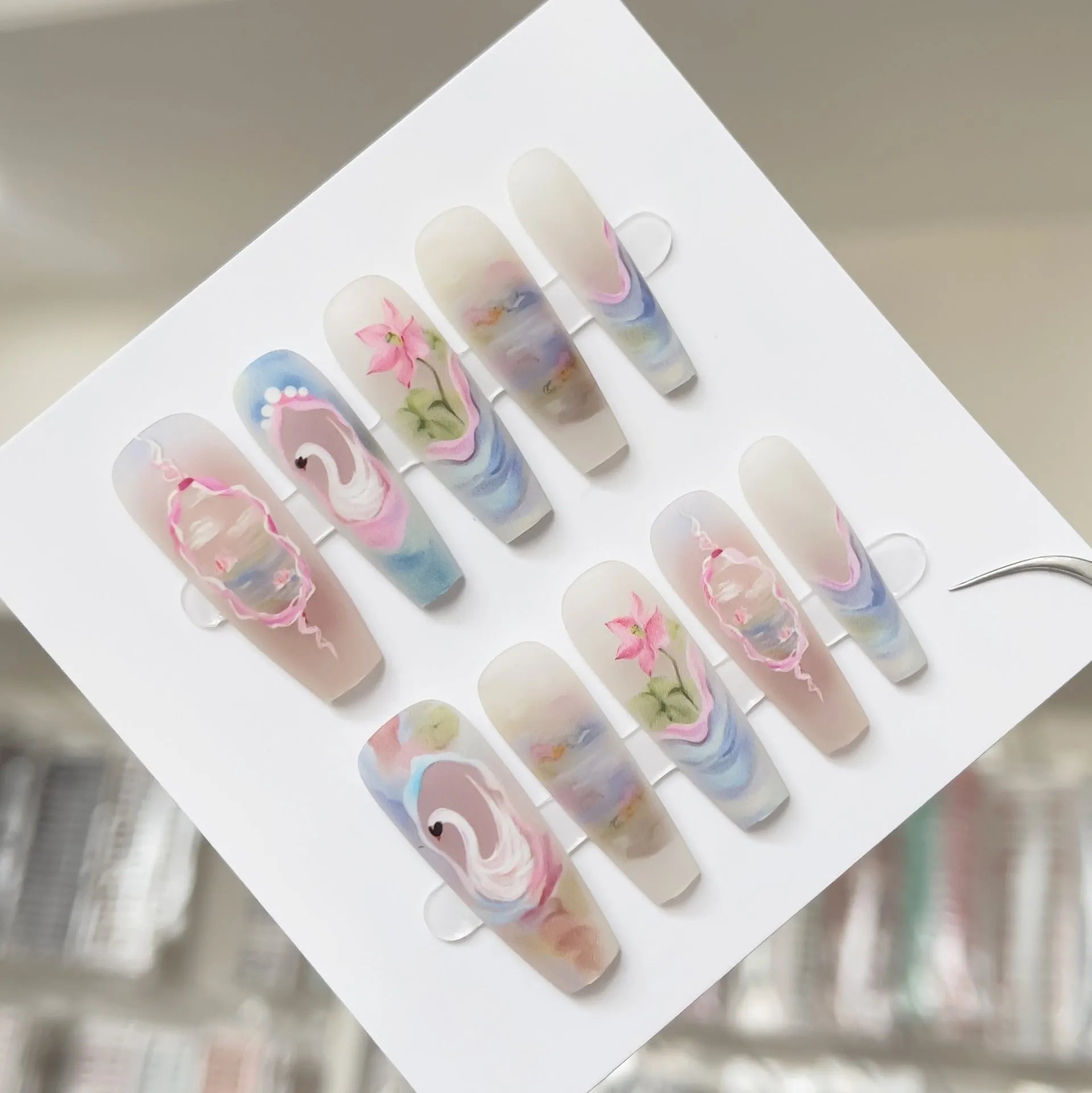 Retro Swan Lake artificial nail tips set in long ladder shape with three finish options: matte, glossy, suede frosted