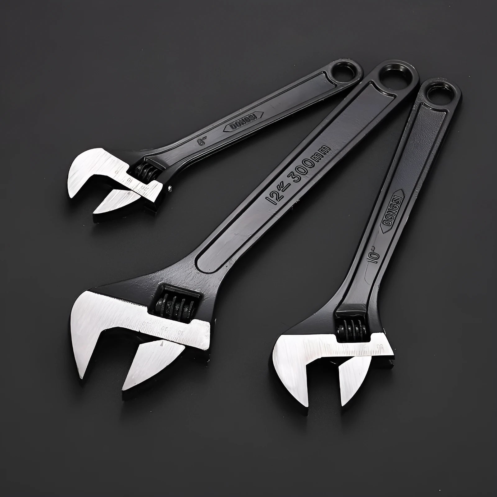 High carbon steel open-end adjustable wrench with black finish on a grey background.