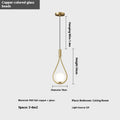 Modern copper bedside chandelier with adjustable hanging cord in minimalist bedroom setting