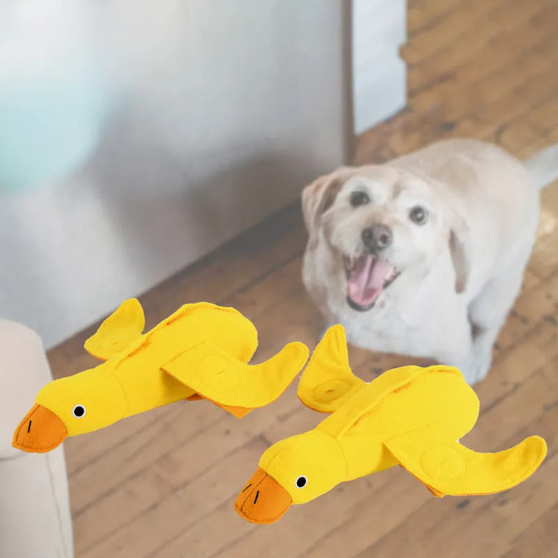 Yellow teddy-shaped rubber dog toy with squeaker duck sound and food leak holes