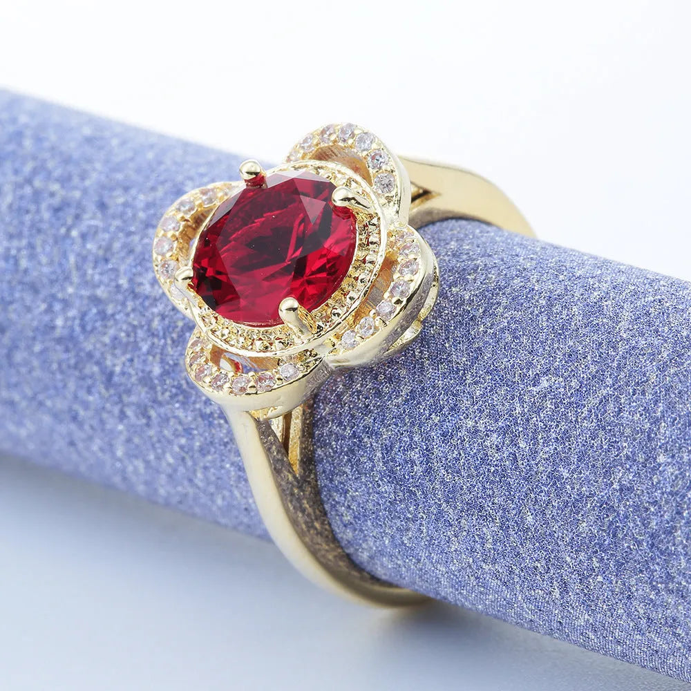 Copper ring with fruit-shaped zircon design in electroplated finish showing sizes 7, 8, 9 options