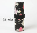 Square canvas rolling pencil case with ballet girl print, showing multiple pencil holes inside.