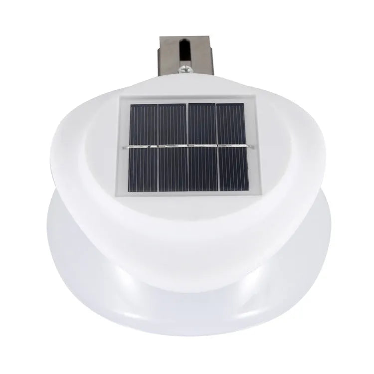 Solar-powered outdoor fence wall lamp with Southeast Asian design in garden setting