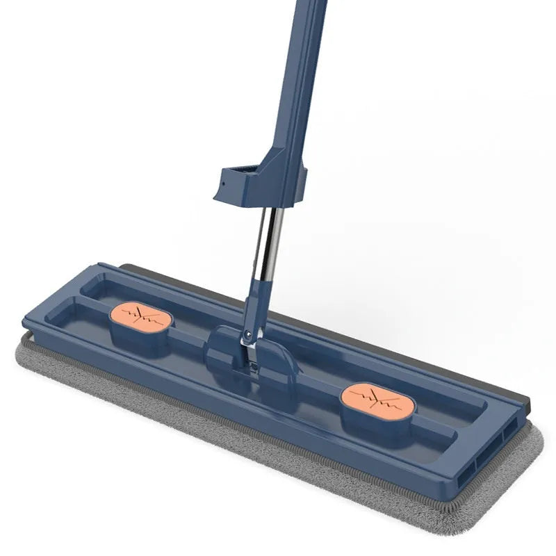 Large flat mop with stainless steel handle and blue mop cloth on hard floor