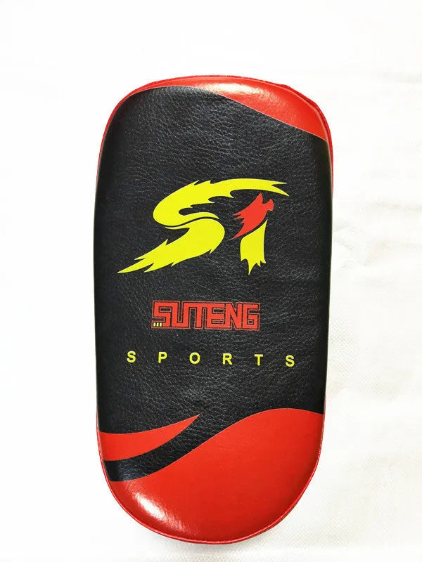 Black square boxing training pad with red trim, showing back with double buckle straps.
