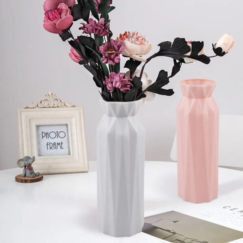 Green melamine drop-resistant vase with a wide base on a wooden table