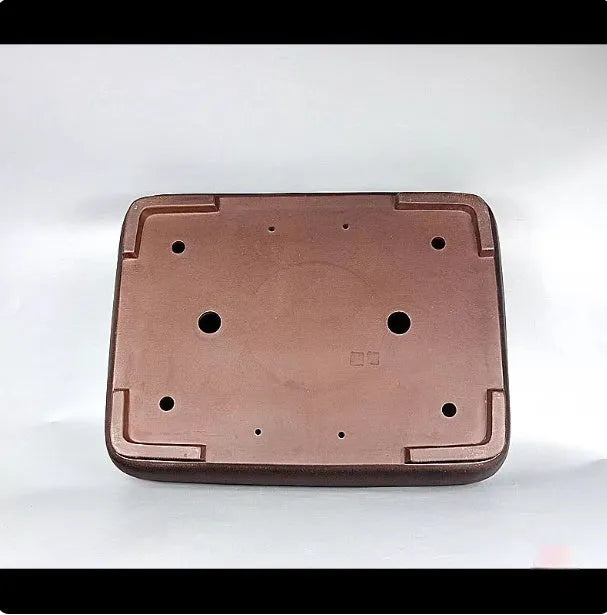 Handmade rectangular antique-style purple clay flower pot showing natural ceramic material