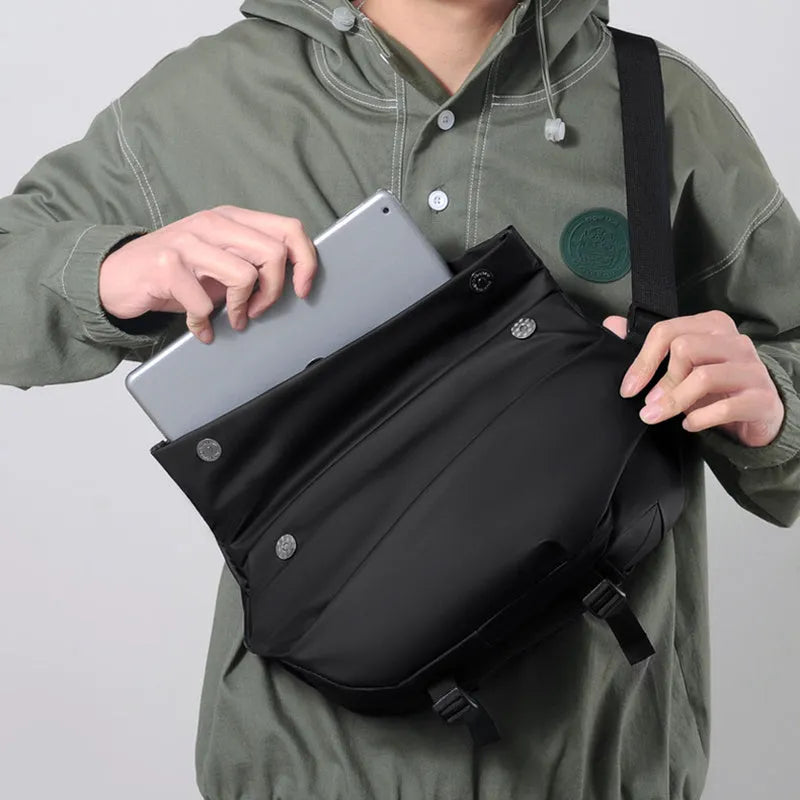 Grey medium-sized crossbody bag for men with shoulder strap and zipper opening