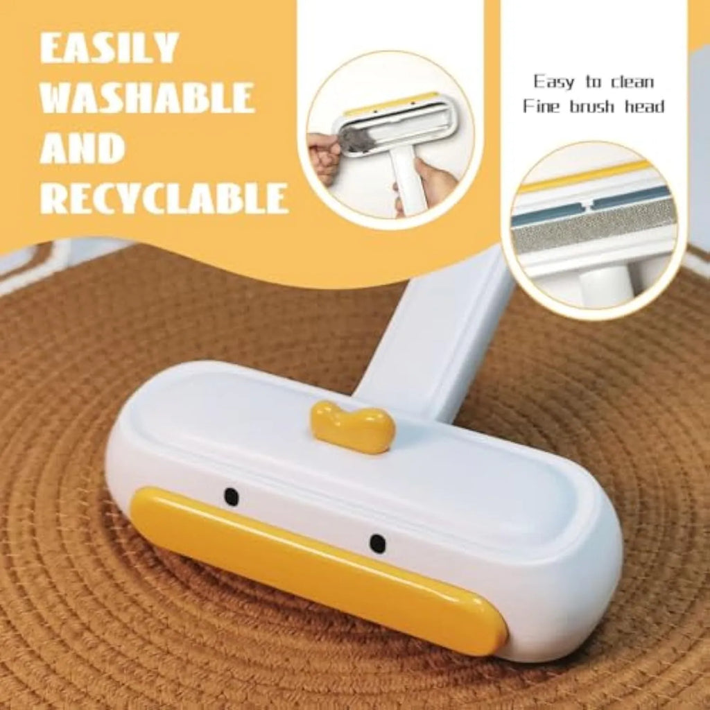 White portable reusable pet hair removal roller with cartoon duck design and dense bristles.