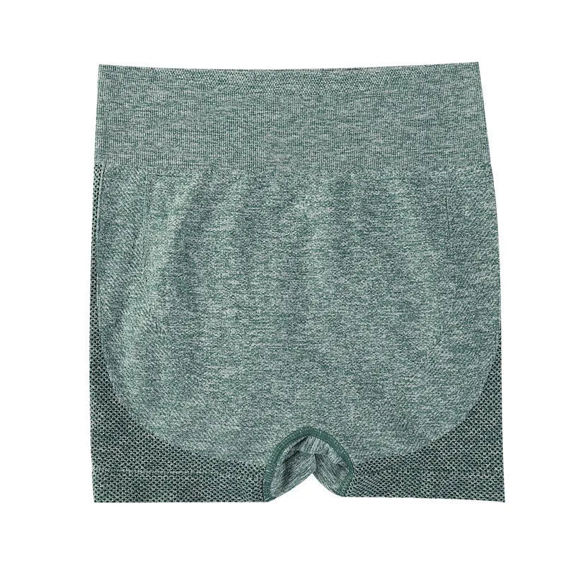 Women's high-waist seamless yoga shorts in black nylon blend fabric for fitness and running