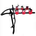 Black and red trunk mounted car bike holder rack showing rope tie and pull belt fastening options.