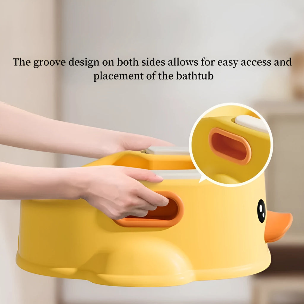 Blue PVC duck-shaped bathtub for washing a small dog or cat.